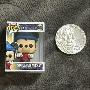 Bitty pop sorcerer Mickey. Brand new. Nickel for size.